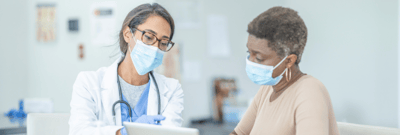 Healthcare professional assisting a resident.