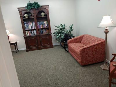Cozy reading nook with books and seating