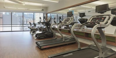 Fitness area with treadmills and mirrors