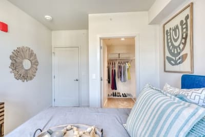 Cozy bedroom showcasing personal items and decor