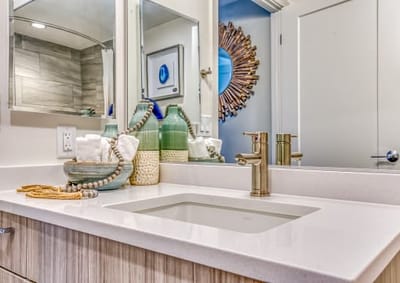 Bathroom sink area with decorative elements.