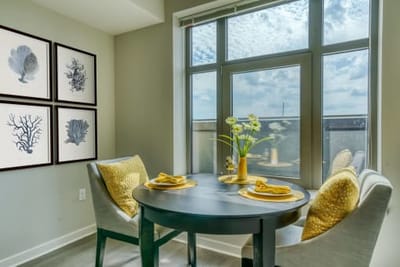 Cozy dining nook with a view and decor.