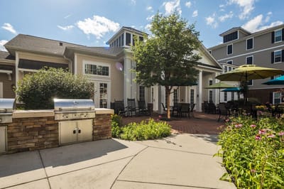 Outdoor patio with seating and barbecue grills