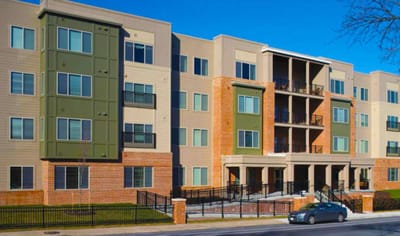 Exterior view of a senior living facility building.