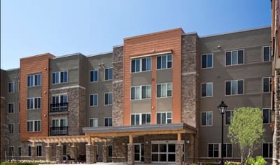 Exterior view of the senior living facility building.