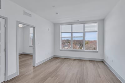 Empty resident room with large windows
