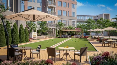 Outdoor seating area with lawn and umbrellas