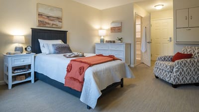 Cozy private resident room with bedding and decor