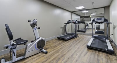Fitness equipment in a gym area