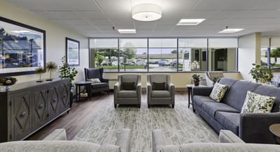 Cozy common area with comfortable seating and natural light.