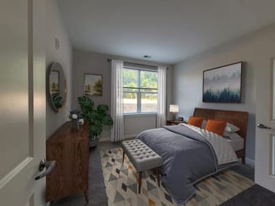 Cozy bedroom with modern furnishings and natural light
