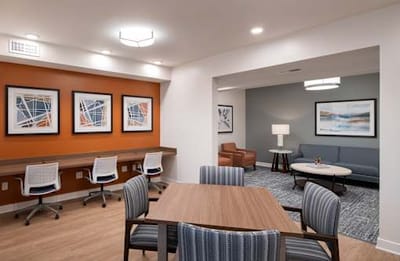Comfortable common area with seating and artwork