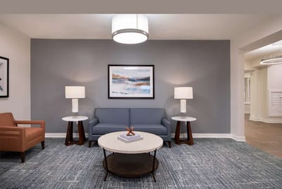 Modern interior living space with seating and decor.