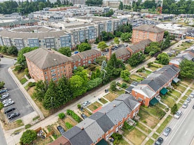 Aerial view of outdoor space around residential buildings.