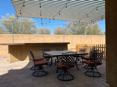 Outdoor seating area with patio and mountain views
