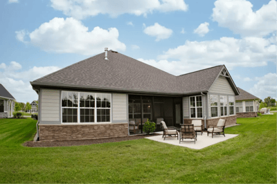 Outdoor patio area with seating at a senior living facility