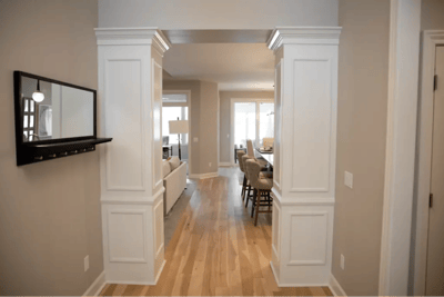 Interior view of a hallway leading to a living space