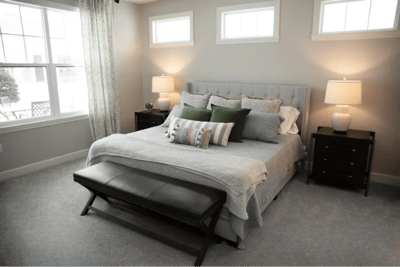 Well-furnished bedroom in a senior living facility