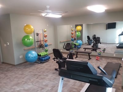 Interior view of a fitness room with exercise equipment