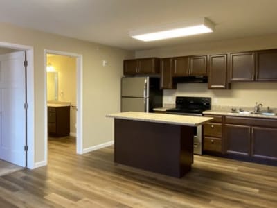 Spacious senior apartment kitchen with modern appliances