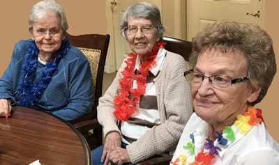 Residents enjoying a festive gathering in a common area