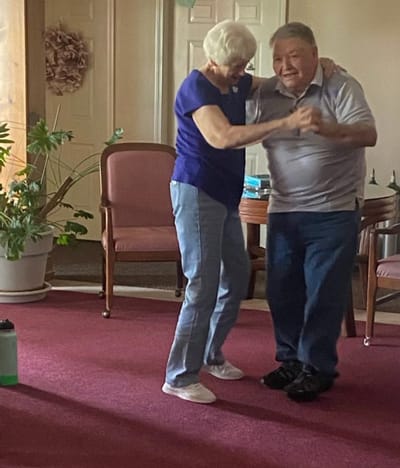 Residents dancing in a common area
