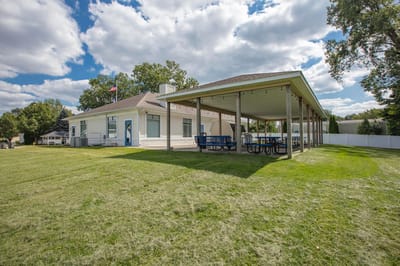 Exterior view of a building and outdoor seating area