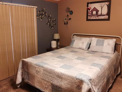 Cozy private resident room with a bed and decor