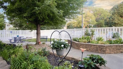 Beautiful outdoor garden area with seating and flowers