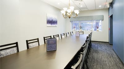 Interior view of a large dining area with a long table