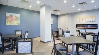Dining area with tables and chairs arranged