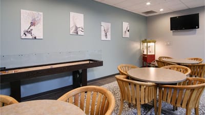 Common area with seating and art on the walls
