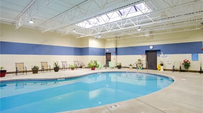 Indoor swimming pool with bright skylights