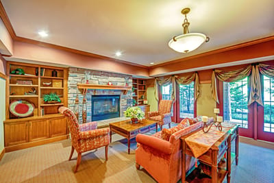 Cozy common area with seating and a fireplace
