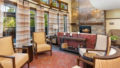 Cozy common area with seating and a fireplace