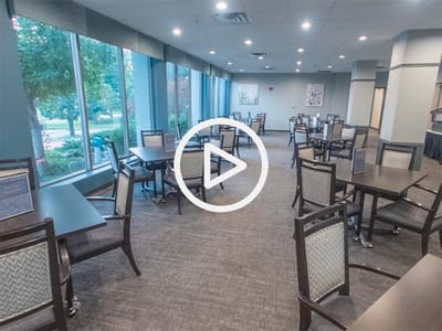 Bright dining area with tables and chairs