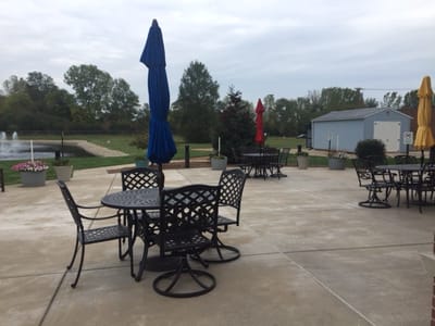 Outdoor seating area with umbrellas and planters
