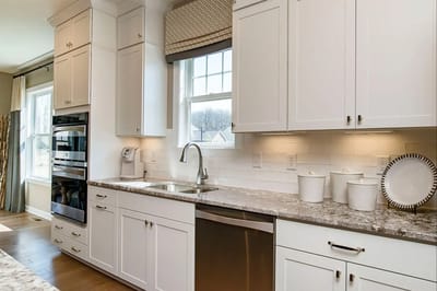 Modern kitchen interior with white cabinetry