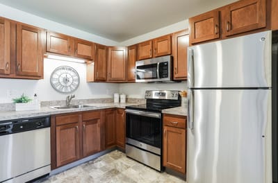 A well-equipped kitchen in a senior living apartment