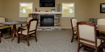 Common area with seating and a fireplace