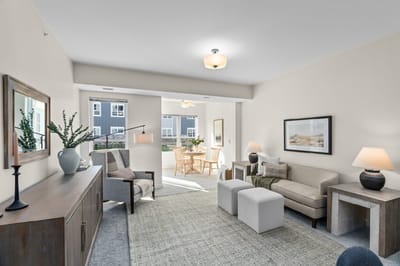 A bright, modern interior living area with furniture