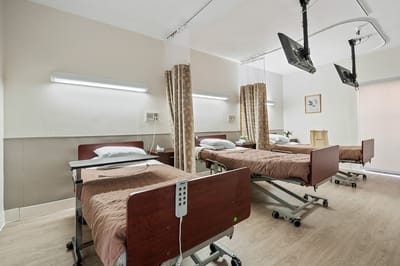 Interior view of a resident room with adjustable beds