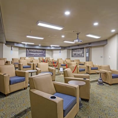 Seating area in a communal lounge with projection equipment