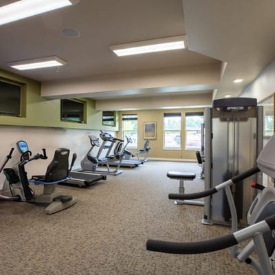 Interior view of a fitness room with exercise equipment
