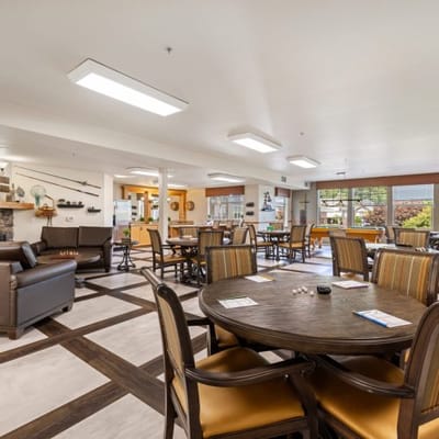 Bright common area with seating and tables