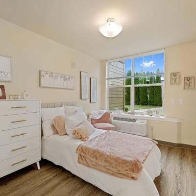 Cozy resident room with natural light and decor