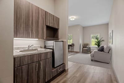 A well-furnished interior of a resident room