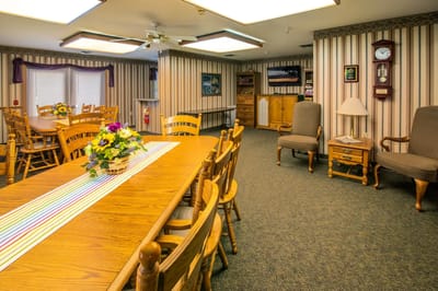 Interior common area with dining tables and decor
