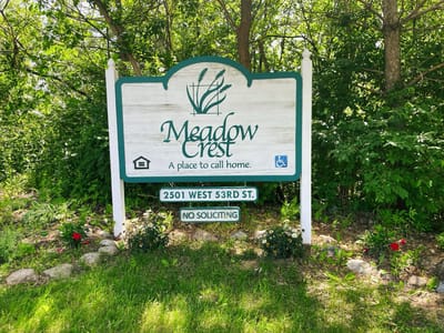 Outdoor sign for Meadowcrest Senior Apartments