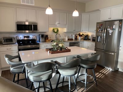 Bright and modern kitchen with seating area